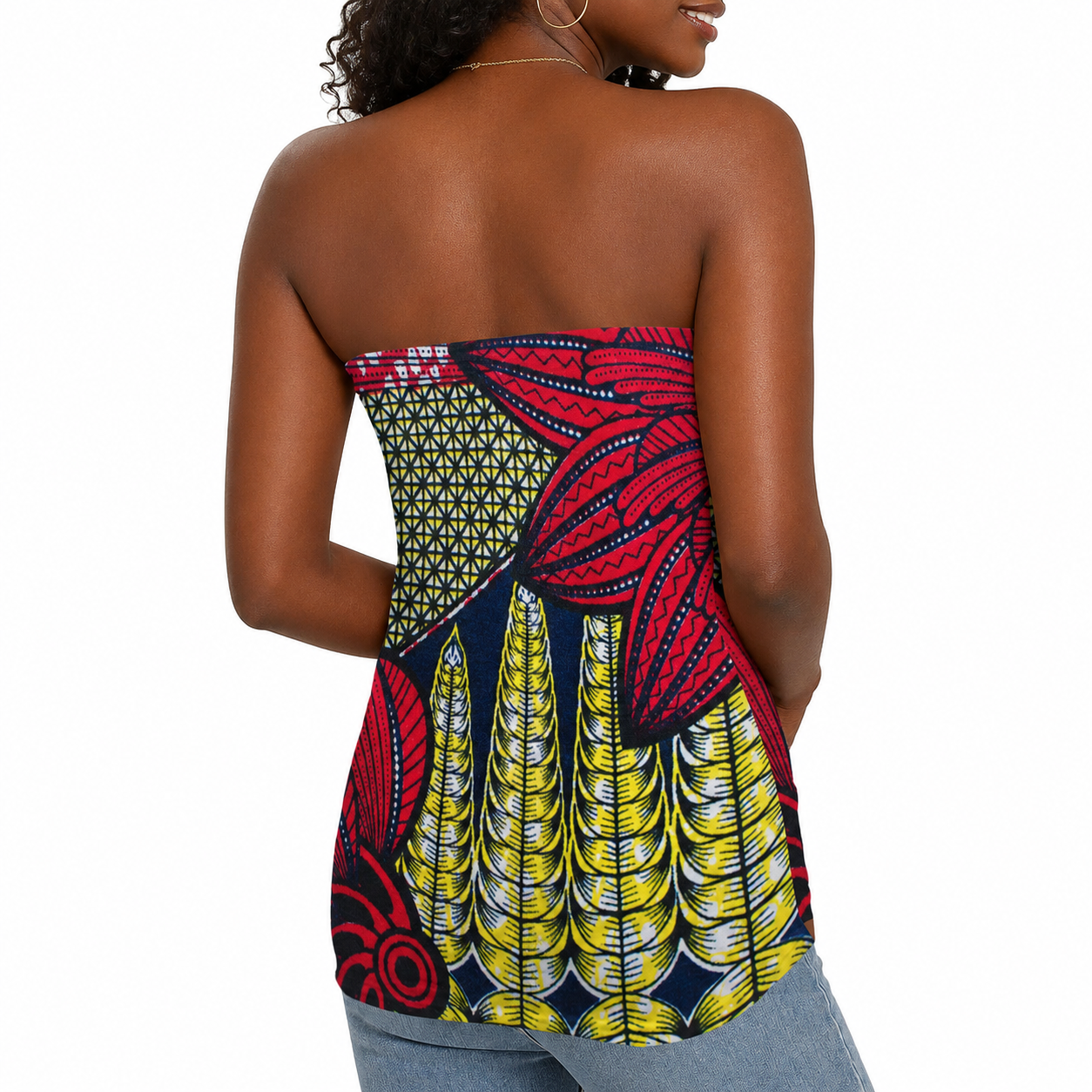 the back view of a woman wearing a colorful, patterned top with a strapless neckline.