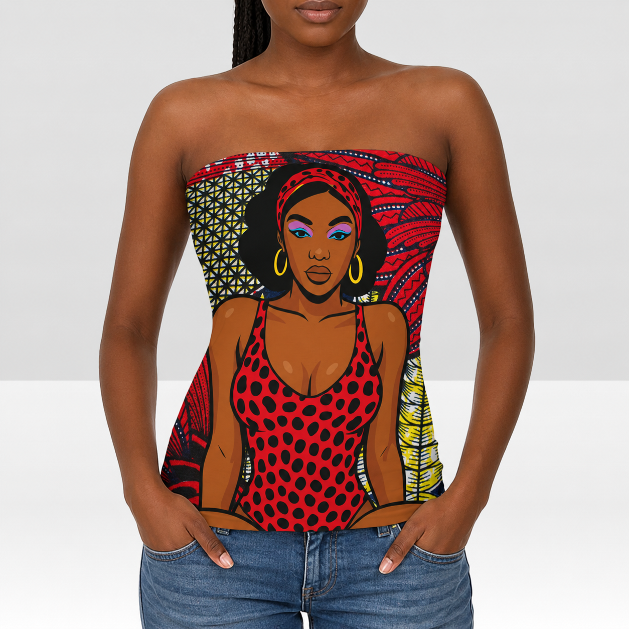 A woman wearing a strapless top with a colorful, patterned design featuring a stylized illustration of a woman.