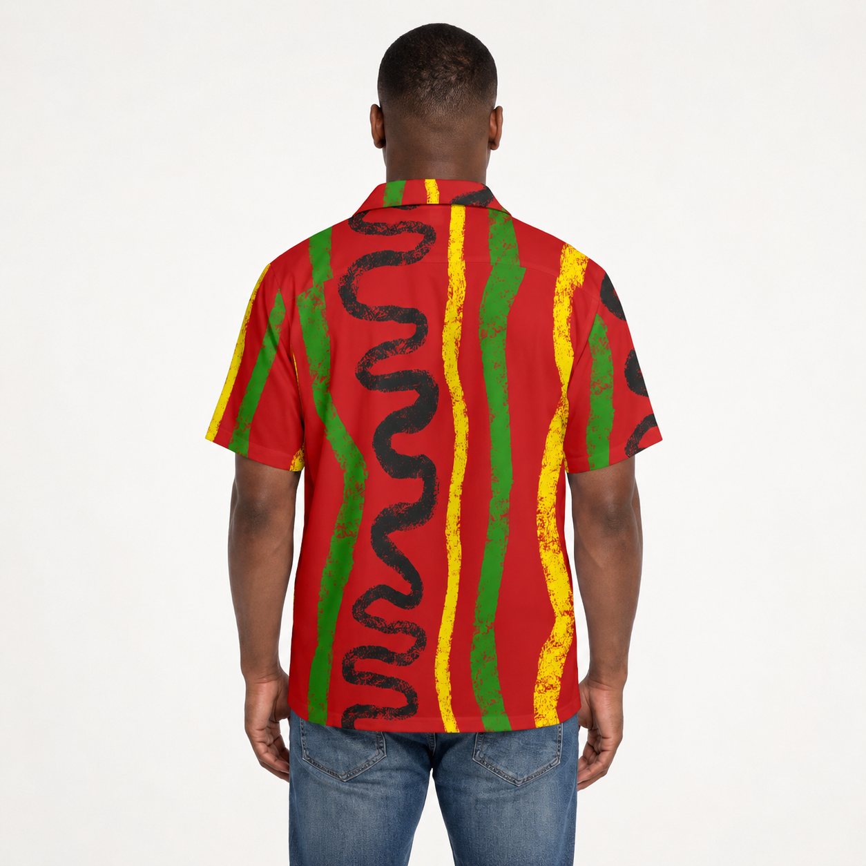 the back view of a man wearing a red and yellow striped shirt with a black and green design.