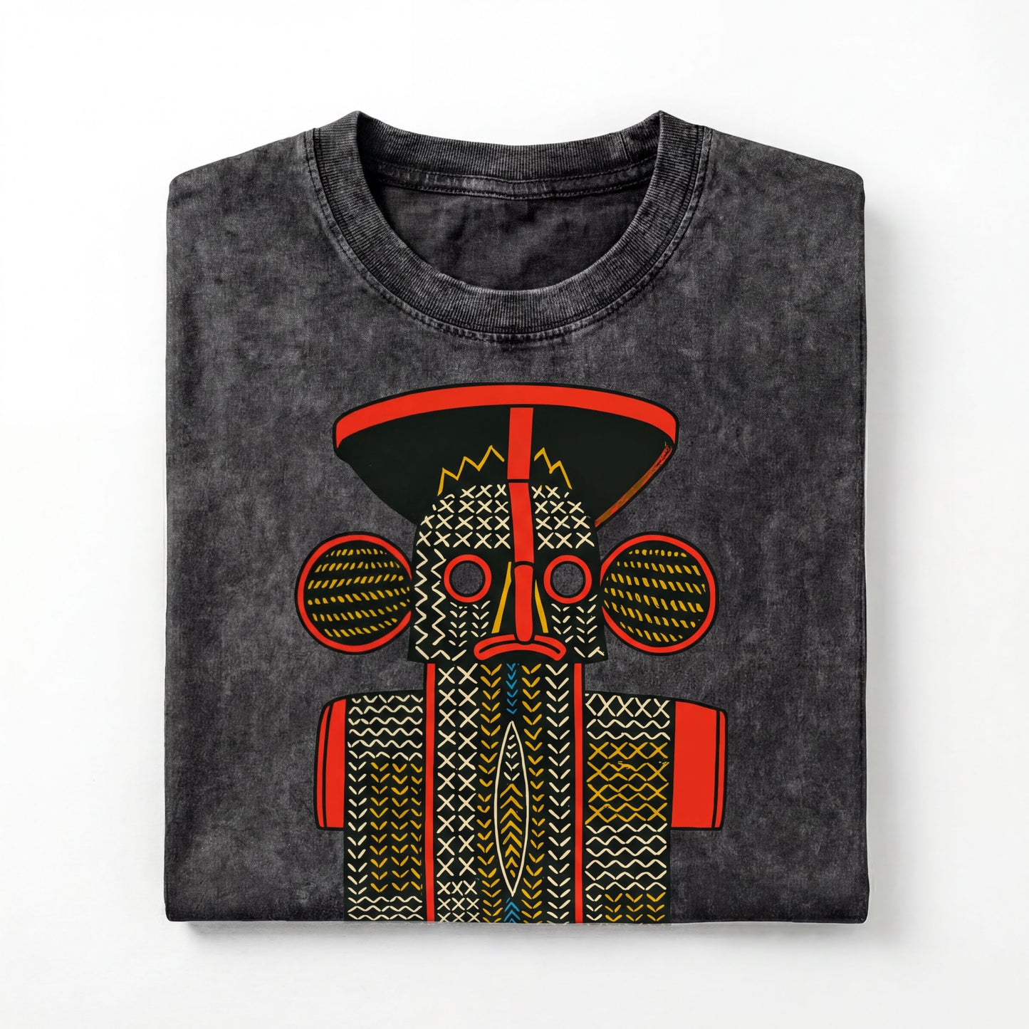 a black t-shirt with a colorful, abstract design depicting a stylized face or mask.