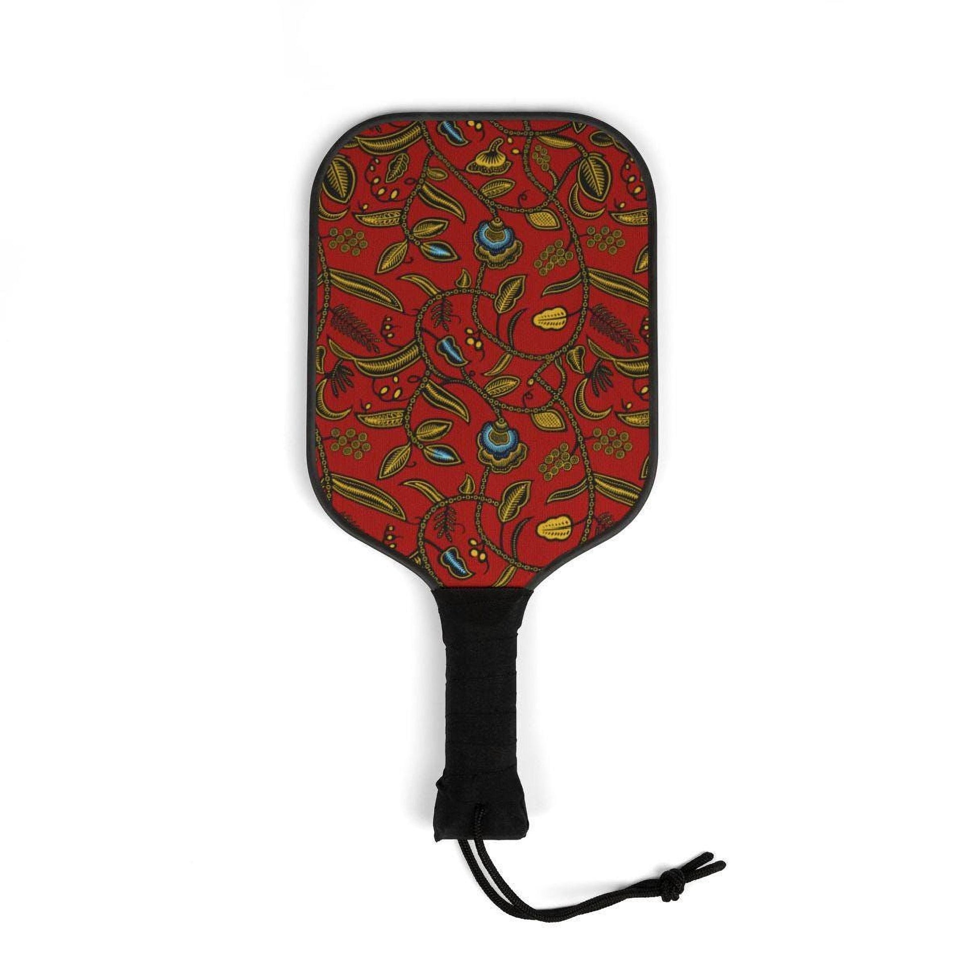 a red paddle with a floral pattern on it.
