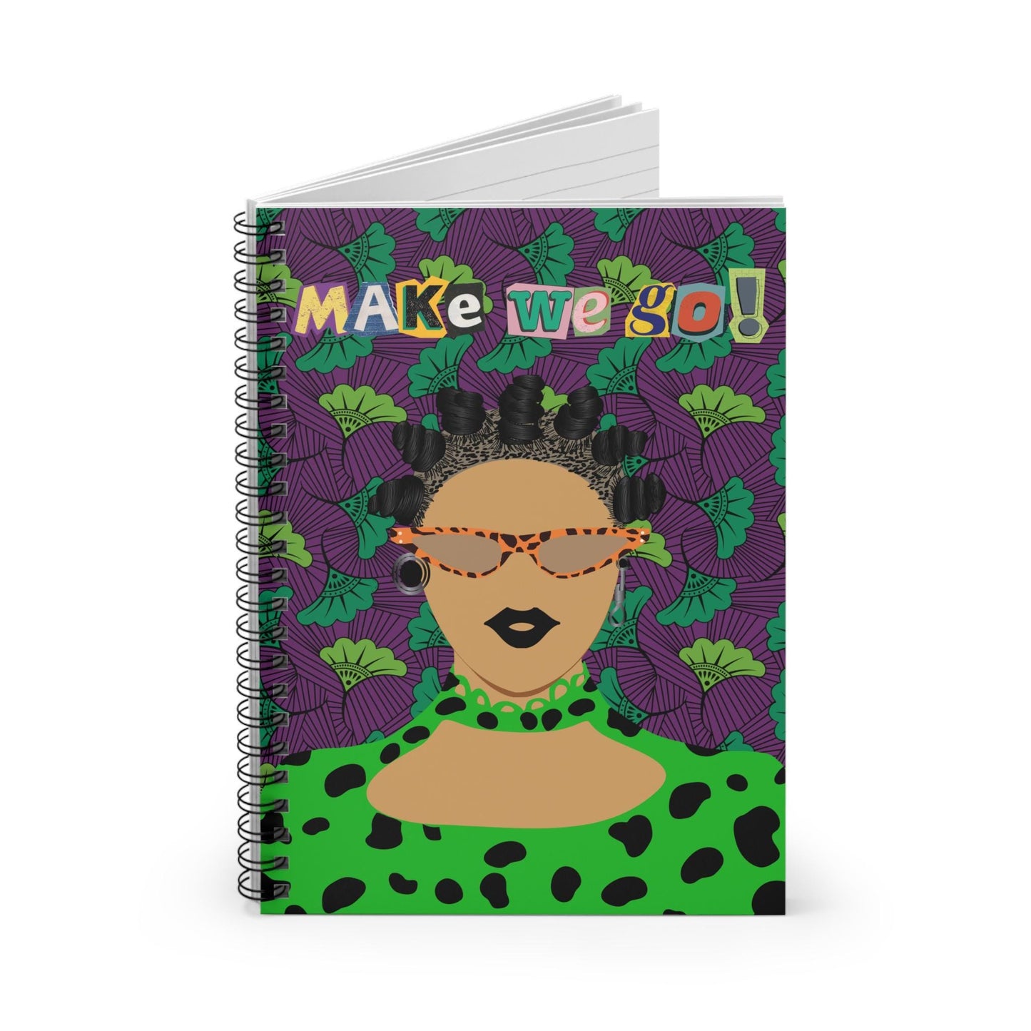 a spiral notebook with a woman's face on it