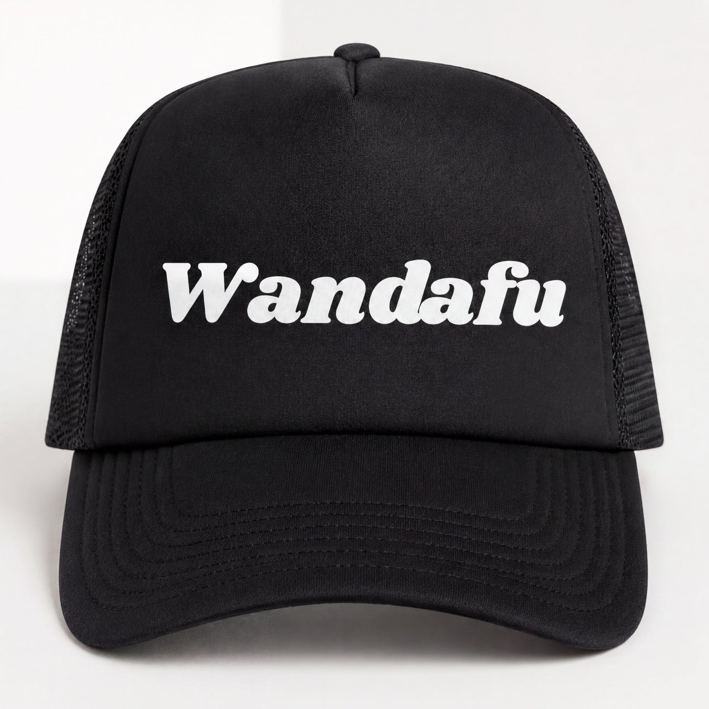 A black baseball cap with the word "Wandafu" printed on it in white text.