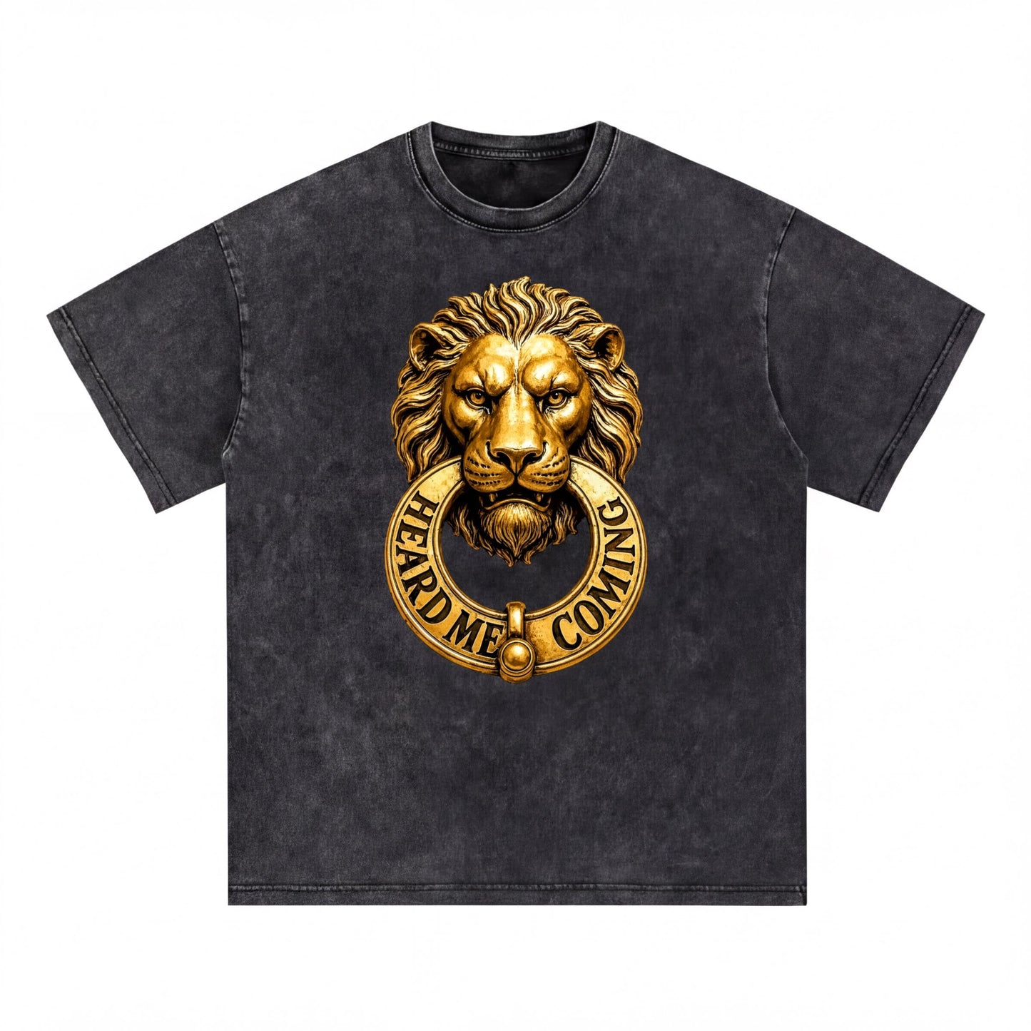 A black t-shirt with a gold lion's head design and the text "HEARD ME COMING" printed on it.