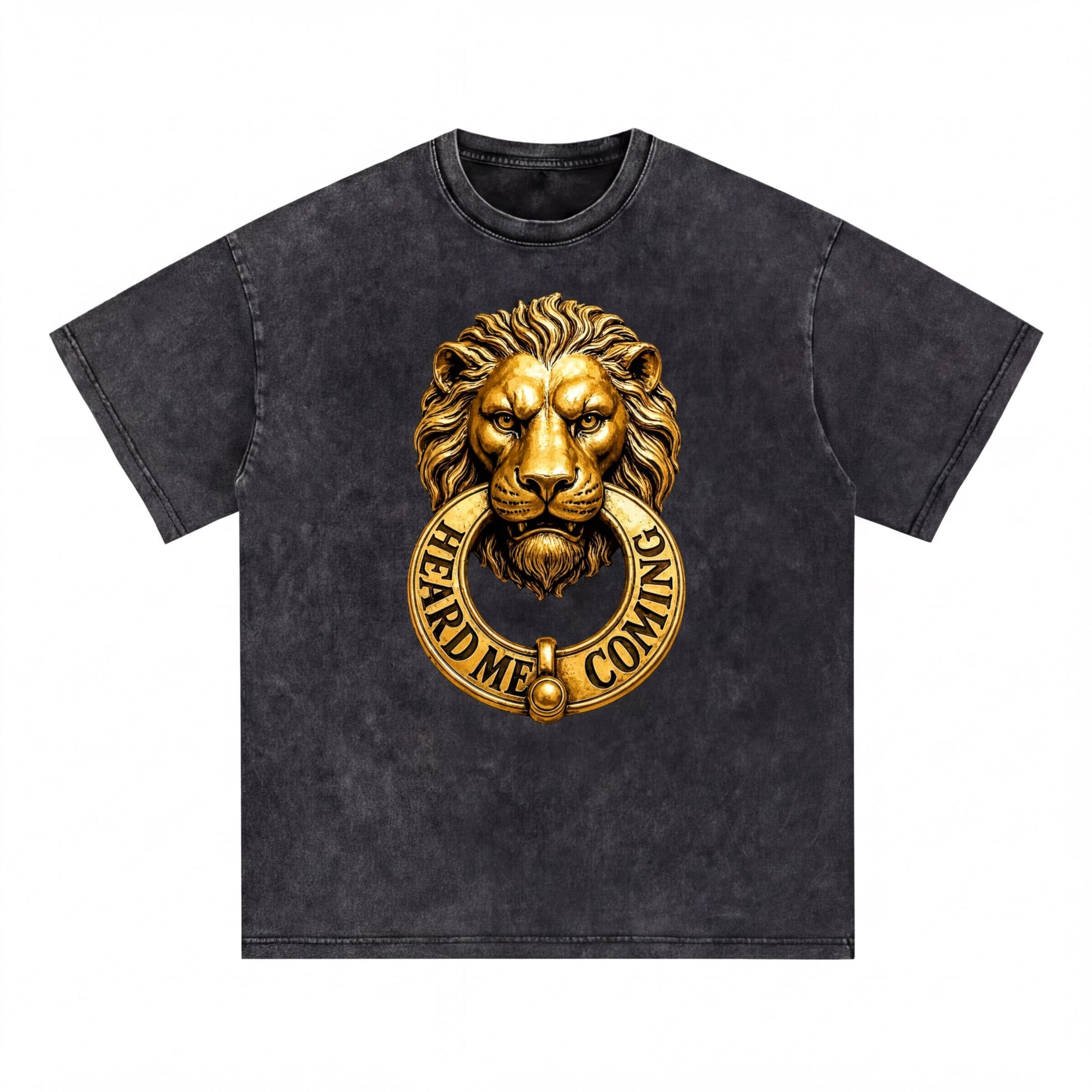 A black t-shirt with a gold lion's head design and the text "HEARD ME COMING" printed on it.
