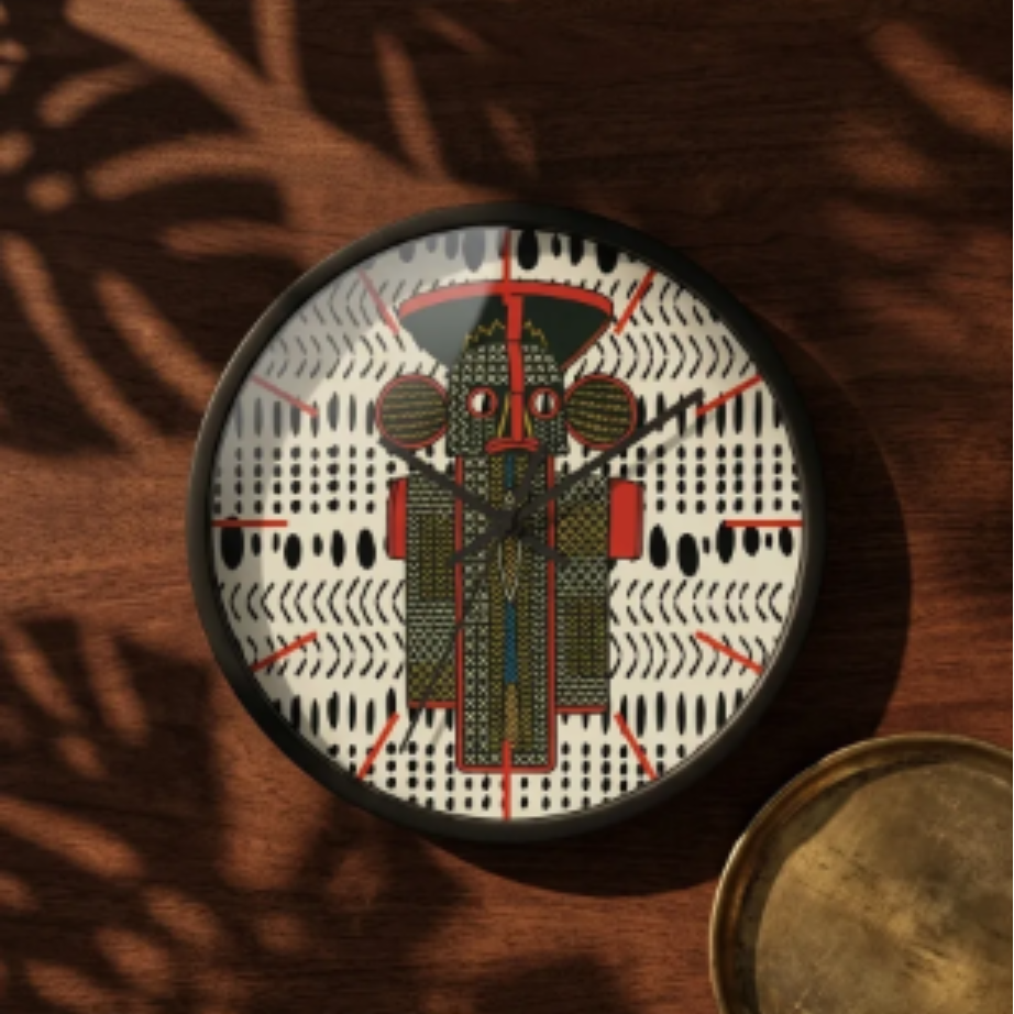 a clock with a unique, abstract design on its face, placed on a wooden surface.