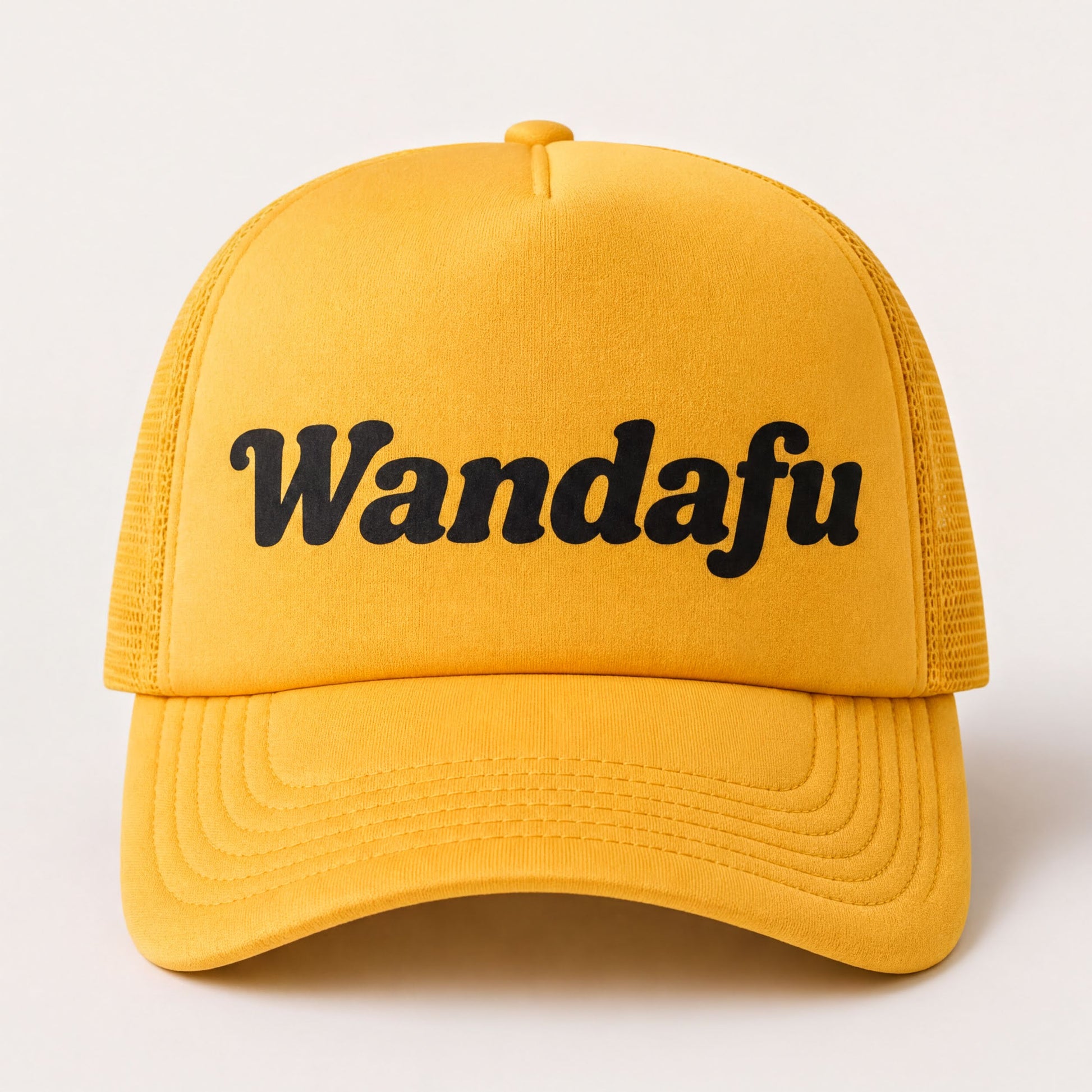 A yellow baseball cap with the text "Wandafu" printed on it.
