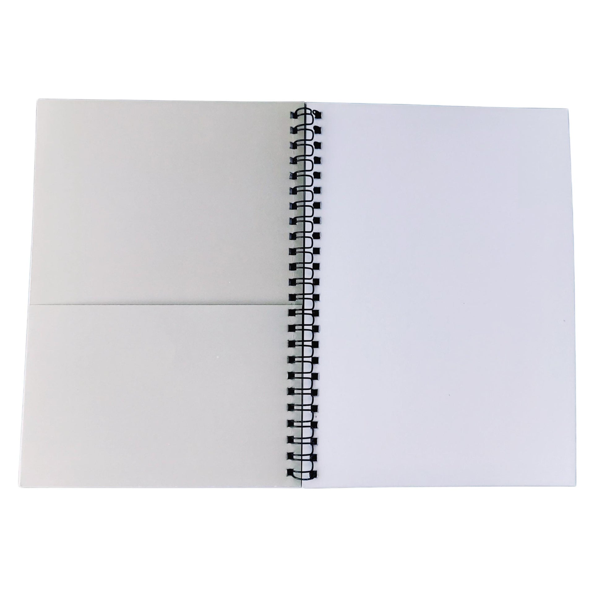 a white notebook with a black pen on top of it