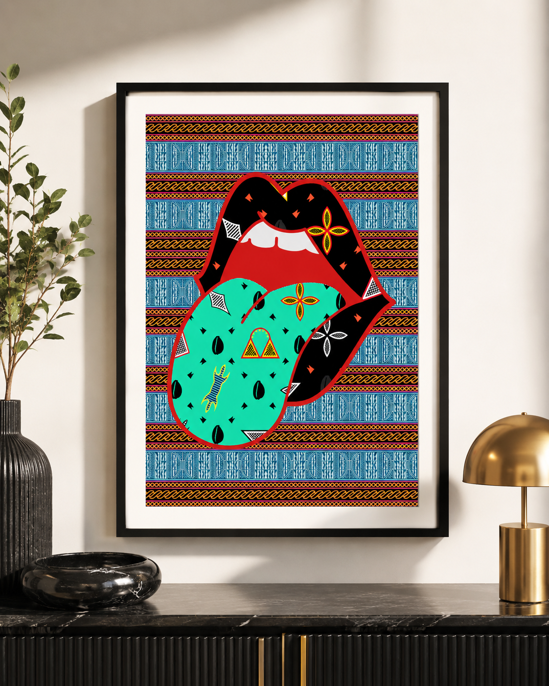 a framed poster with a vibrant, colorful design of a tongue with a patterned mouth, set against a background with a geometric pattern.