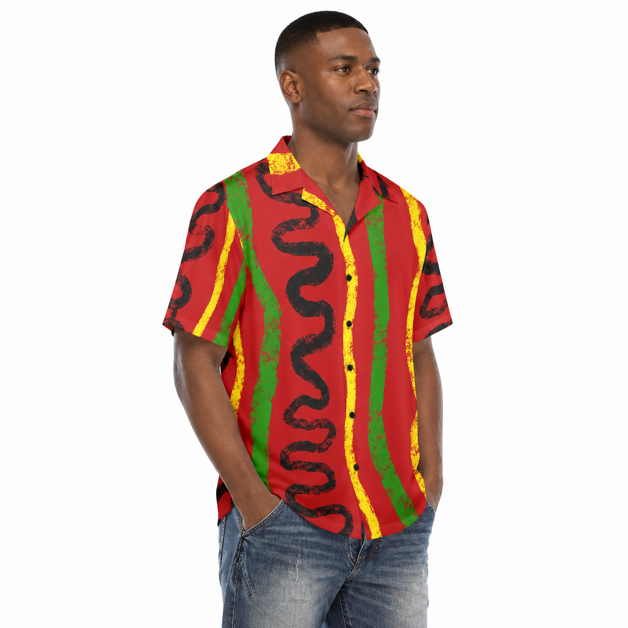 A man wearing a red and yellow striped shirt with a black and green pattern stands against a white background.