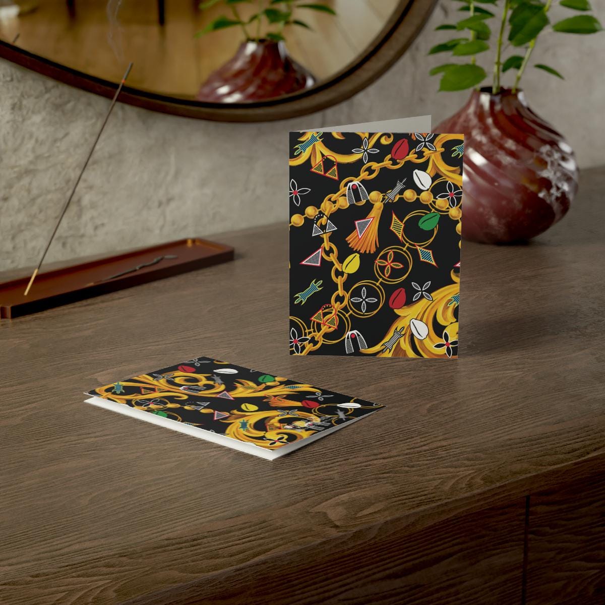 a table with a mirror and a card on it