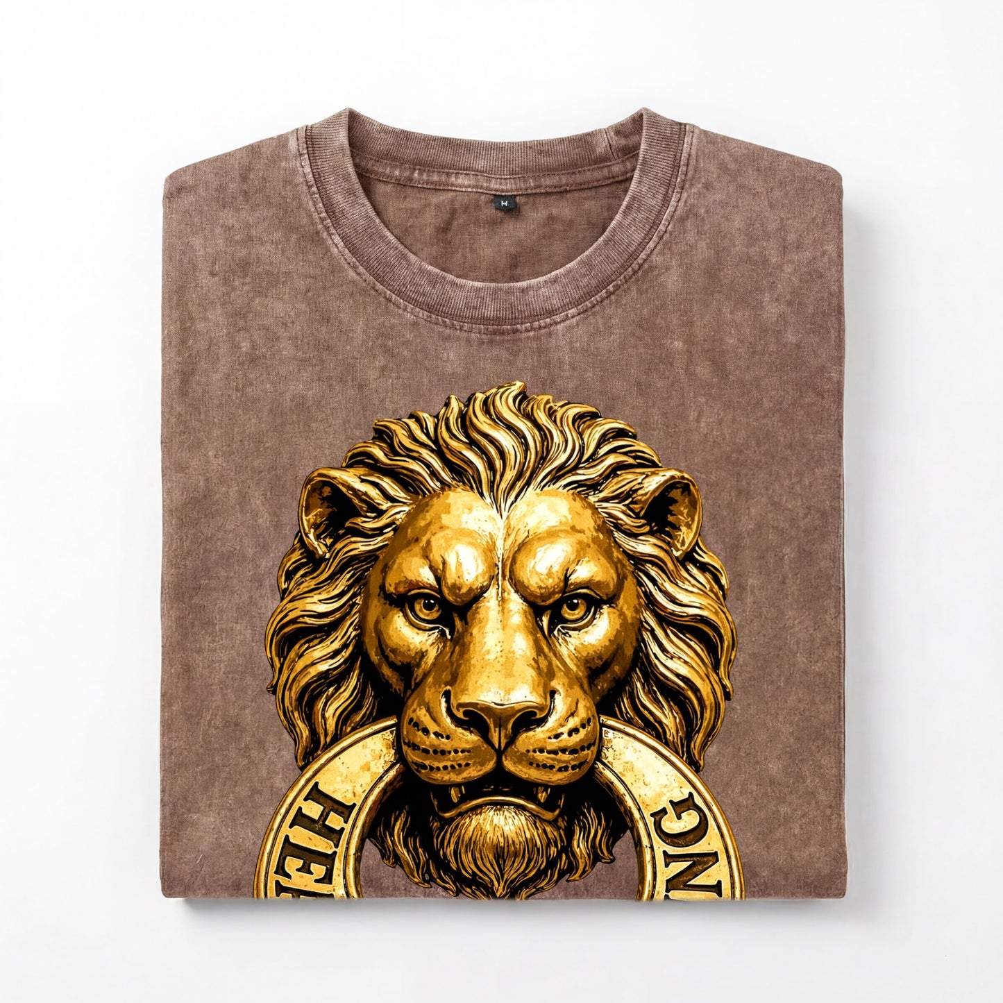 a brown t-shirt with a gold lion's head design and the word "HELL" printed on it.