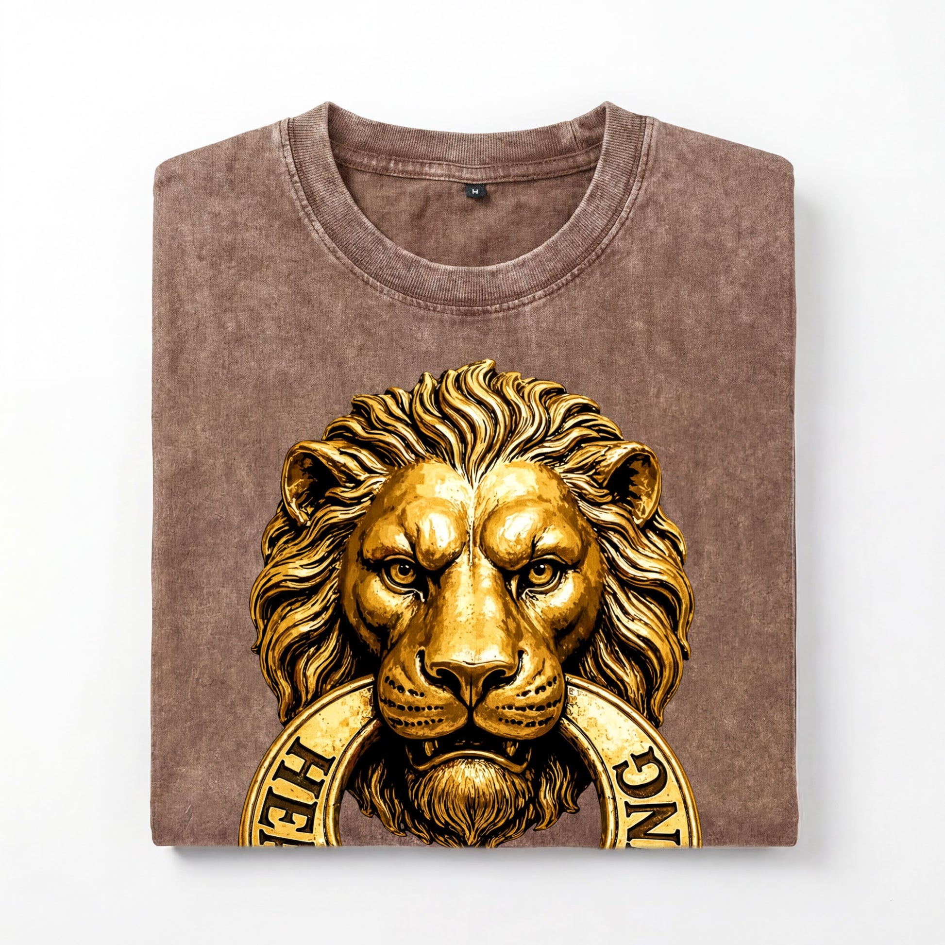 a brown t-shirt with a gold lion's head design and the word "HELL" printed on it.